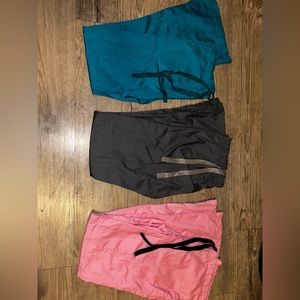 Brand new , never worn FSH scrubs 3 pairs of assorted colors.